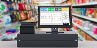 A modern touch screen running the free trial version of Paperless Pharmacy software.